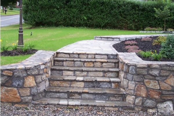 Natural stone retaining wall with steps in Trumbull CT